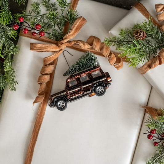 Brown SUV with Tree Ornament